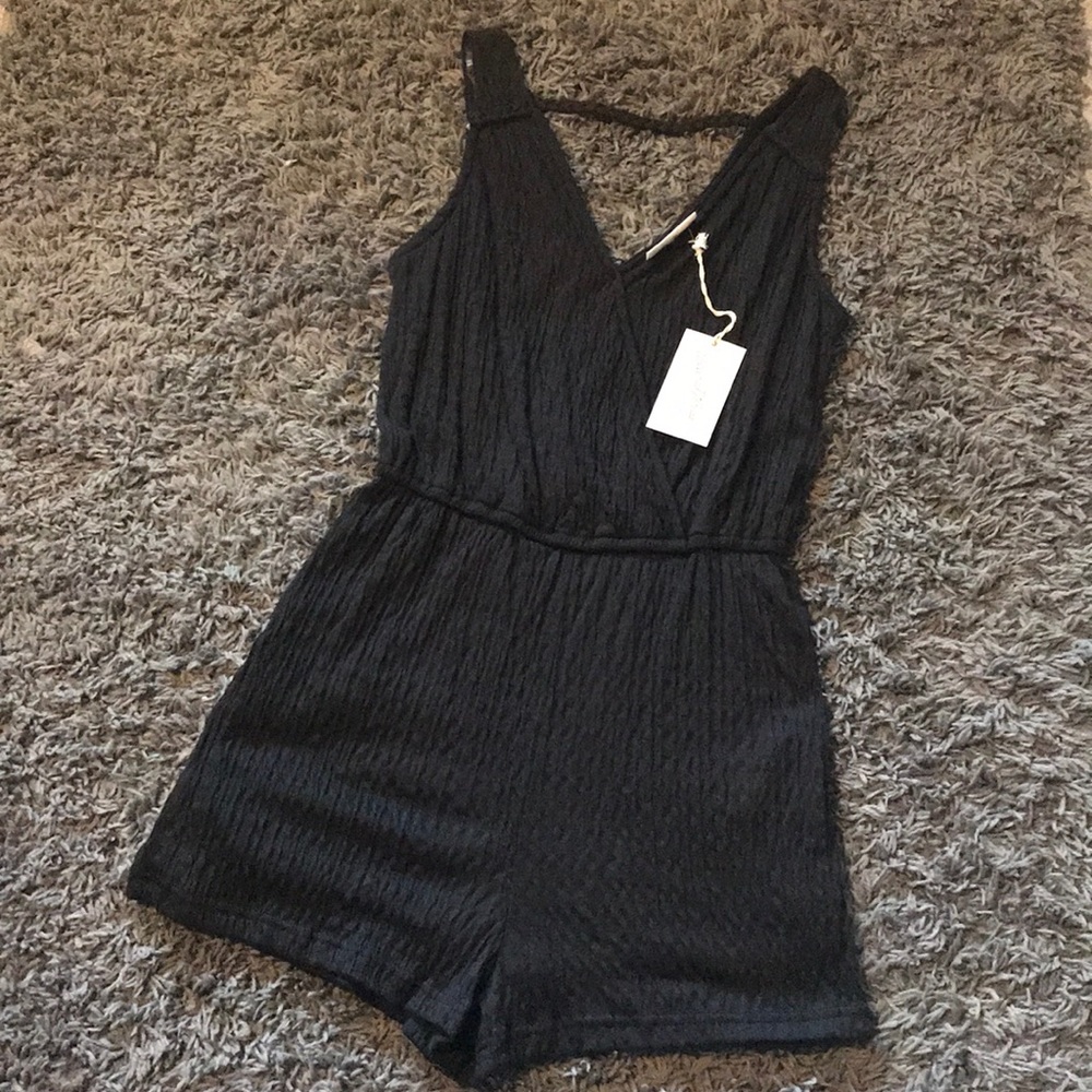 Black romper new with tags !